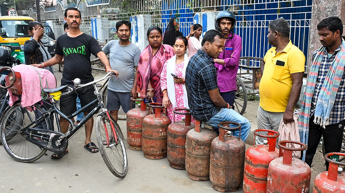 People queue up to book LPG cylinders at an Indane gas agency, in Patna, Bihar, March 11, 2026.