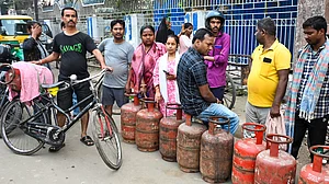 People queue up to book LPG cylinders at an Indane gas agency, in Patna, Bihar, March 11, 2026.