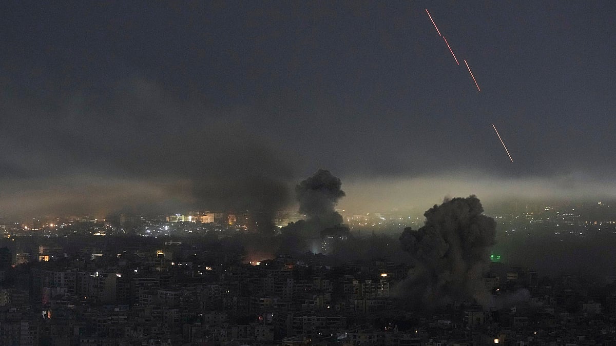 Warning shots fired into the air following Israeli airstrikes in Dahiyeh, Beirut.