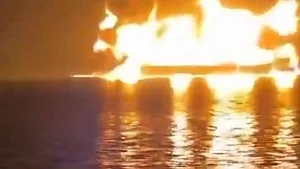 An oil tanker on fire at Basra port in Iraq