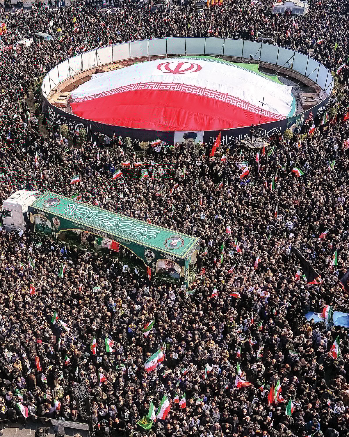 Iranians attend the funeral of IRGC commanders at Enghelab (Revolution) Square in Tehran 