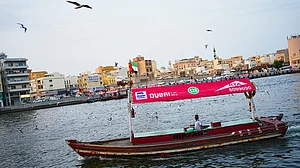 An empty tourist boat in Dubai Creek next to Al Seef market, one of Dubai's busiest tourist areas, 13 Mar