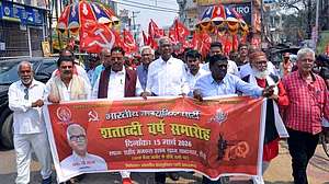 CPI leader D. Raja during a public march.
