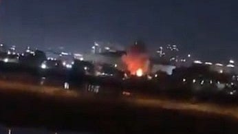 Screen grab captures drone strike near US Embassy in Baghdad amid escalating tensions.