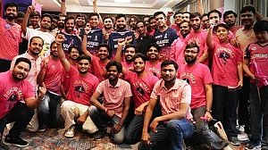 Riyan Parag (centre) unveils the 2026 jersey with other teammates earlier this week