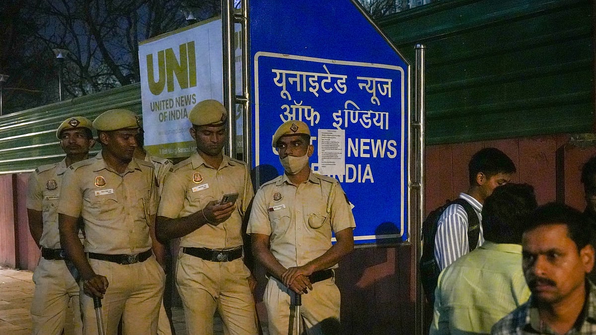 Delhi police outside the UNI office