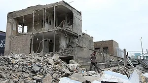 Buildings lie damaged following US-Israel strikes in Iran.