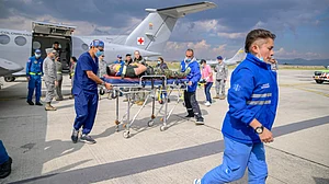 Injured survivors of Puerto Leguizamo crash arrive in Bogotá for treatment.