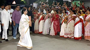 Mamata Banerjee greets TMC workers