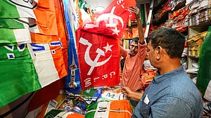 Flags of political parties on sale in Kolkata, 24 March