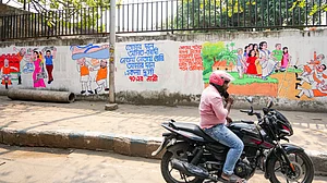 Wall graffiti for the West Bengal Assembly elections, in Kolkata, 25 March