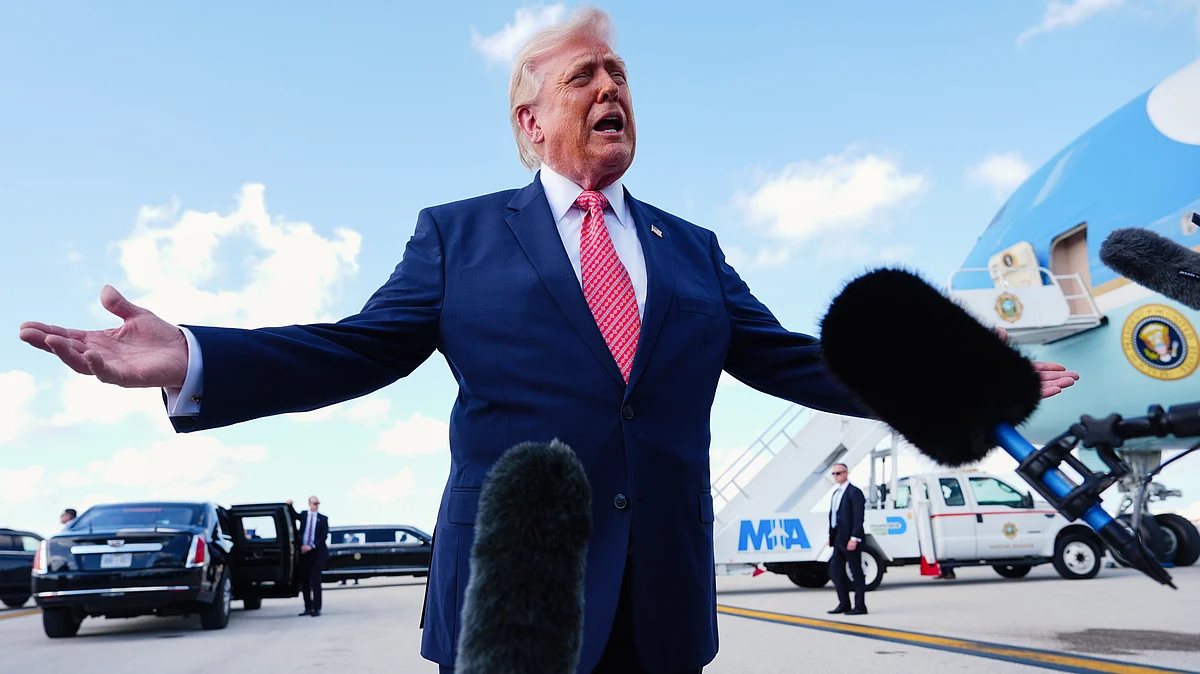 Donald Trump speaks to reporters in Miami, 27 March