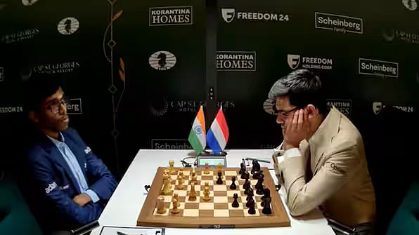 Praggnanandhaa (left) and Anish Giri during their first round game in Cyprus.