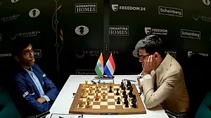 Praggnanandhaa (left) and Anish Giri during their first round game in Cyprus.