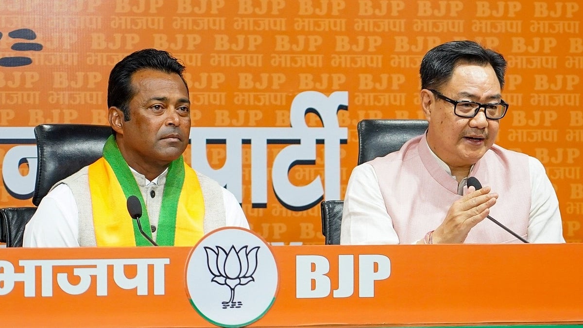 Leander Paes and Kiren Rijuju at  the press conference