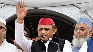 Akhilesh Yadav speaks during a public event.