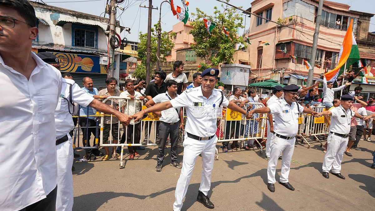 Police outside Mamata Banerjee's residence during a BJP roadshow for filing of nominations, Kolkata
