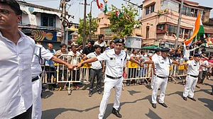Police outside Mamata Banerjee's residence during a BJP roadshow for filing of nominations, Kolkata