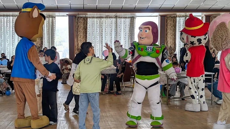 Doctors stage children’s celebration at Tehran hospital.