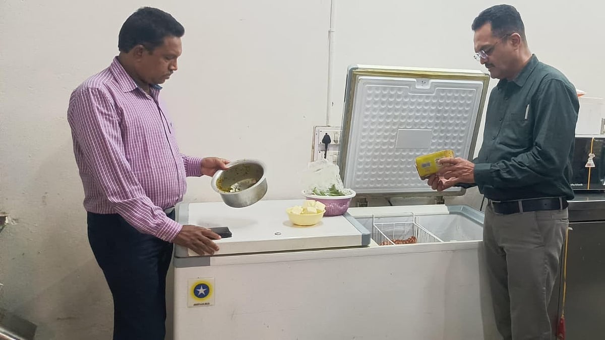 FDCA officials inspect a food outlet during a quality check drive.