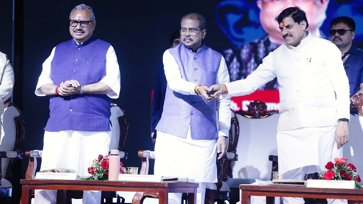 Dharmendra Pradhan (C) and Mohan Yadav at the Ujjain conference