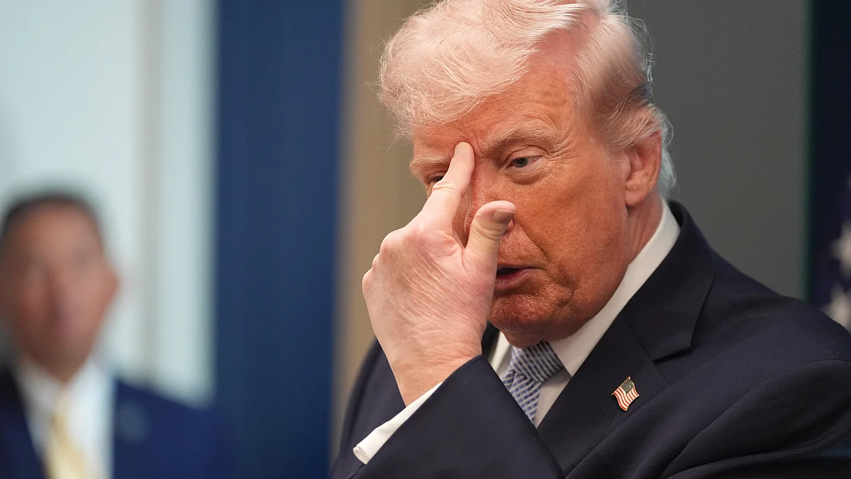 Donald Trump speaks with reporters at White House.