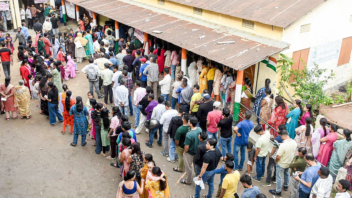Long queues outside a polling station in Guwahati