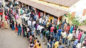 Long queues outside a polling station in Guwahati