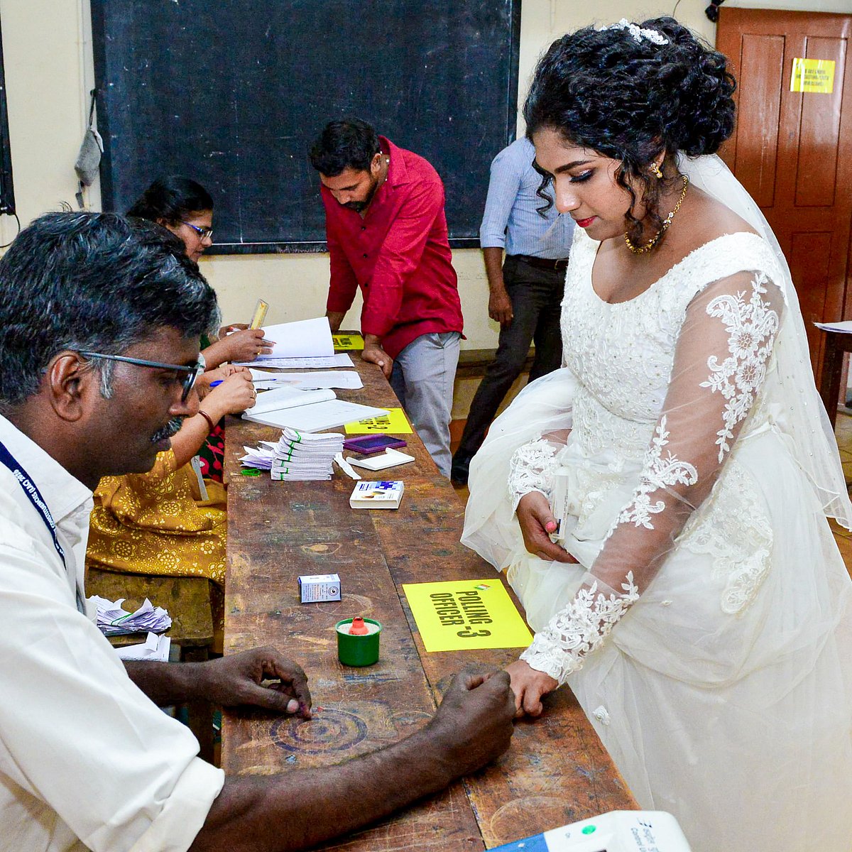 A bride at a polling booth in Meppadi, Kerala