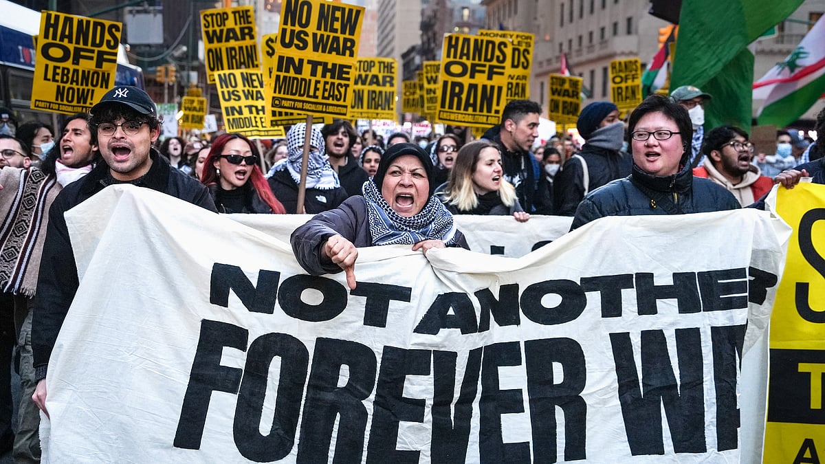 People march in protest against the US-Israeli war with Iran and conflict in Lebanon.