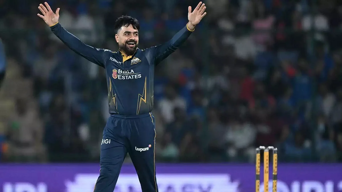 A jubilant Rashid Khan after capturing one of his three wickets against Delhi Capitals.