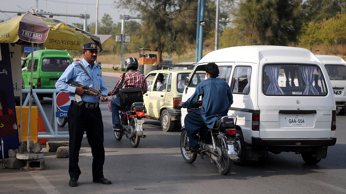 Policeman guards a checkpoint in Islamabad.