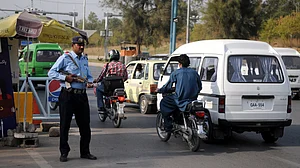 Policeman guards a checkpoint in Islamabad.