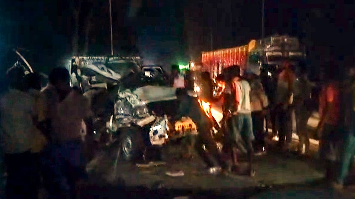 The damaged vehicle at the collision site in Katihar district.