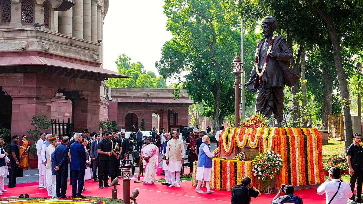 PM Modi pays tribute to Mahatma Jyotiba Phule at the Parliament premises in New Delhi, 11 April