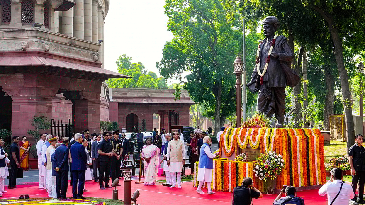 PM Modi pays tribute to Mahatma Jyotiba Phule at the Parliament premises in New Delhi, 11 April
