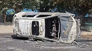 A vehicle set ablaze in Noida