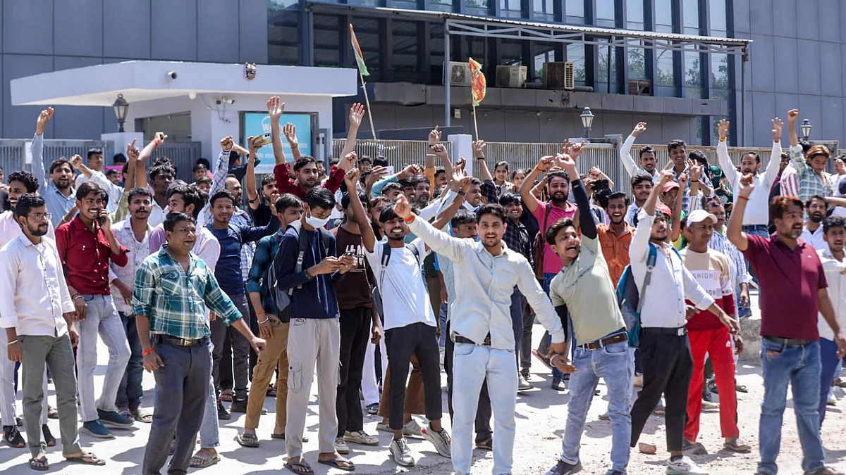 Factory workers during a protest demanding a hike in wages, in Noida, Gautam Buddh Nagar district.