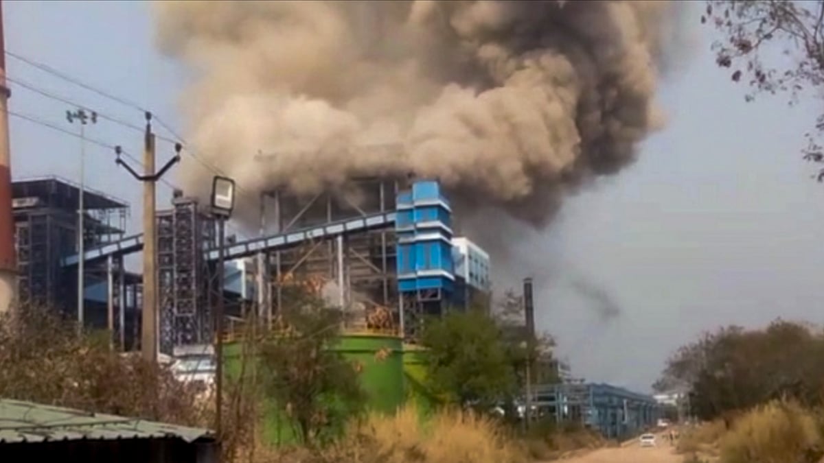 Smoke billows from a Vedanta power plant in Singhitarai, Sakti district.