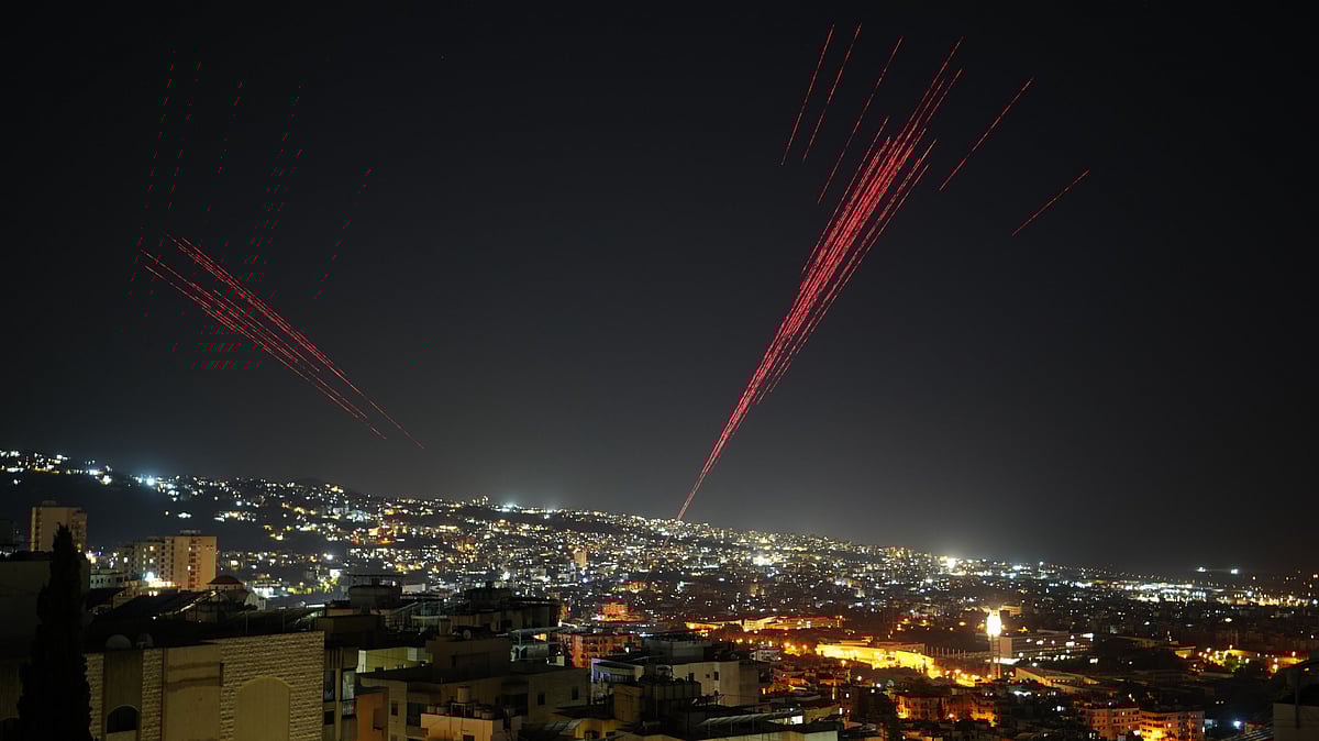 Tracer rounds and fireworks light up Beirut as residents mark Israel-Hezbollah ceasefire.