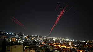 Tracer rounds and fireworks light up Beirut as residents mark Israel-Hezbollah ceasefire.