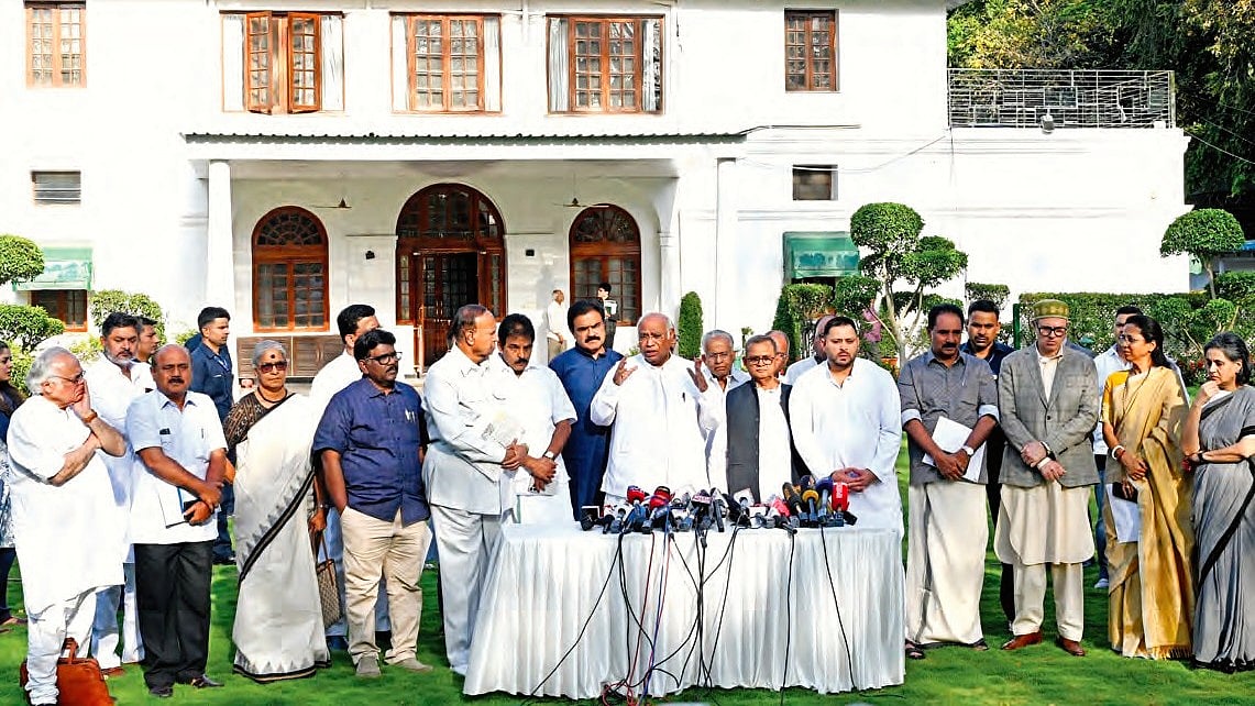 Kharge addresses the media on 15 April after an Opposition meeting on the women’s reservation Bill