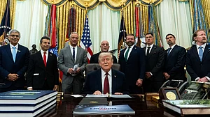 Donald Trump speaks at Oval Office on 18 April.