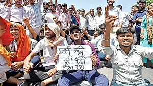 Driven to desperation, workers across India have hit the streets, such as these in Noida