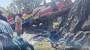 The overturned bus in Udhampur.