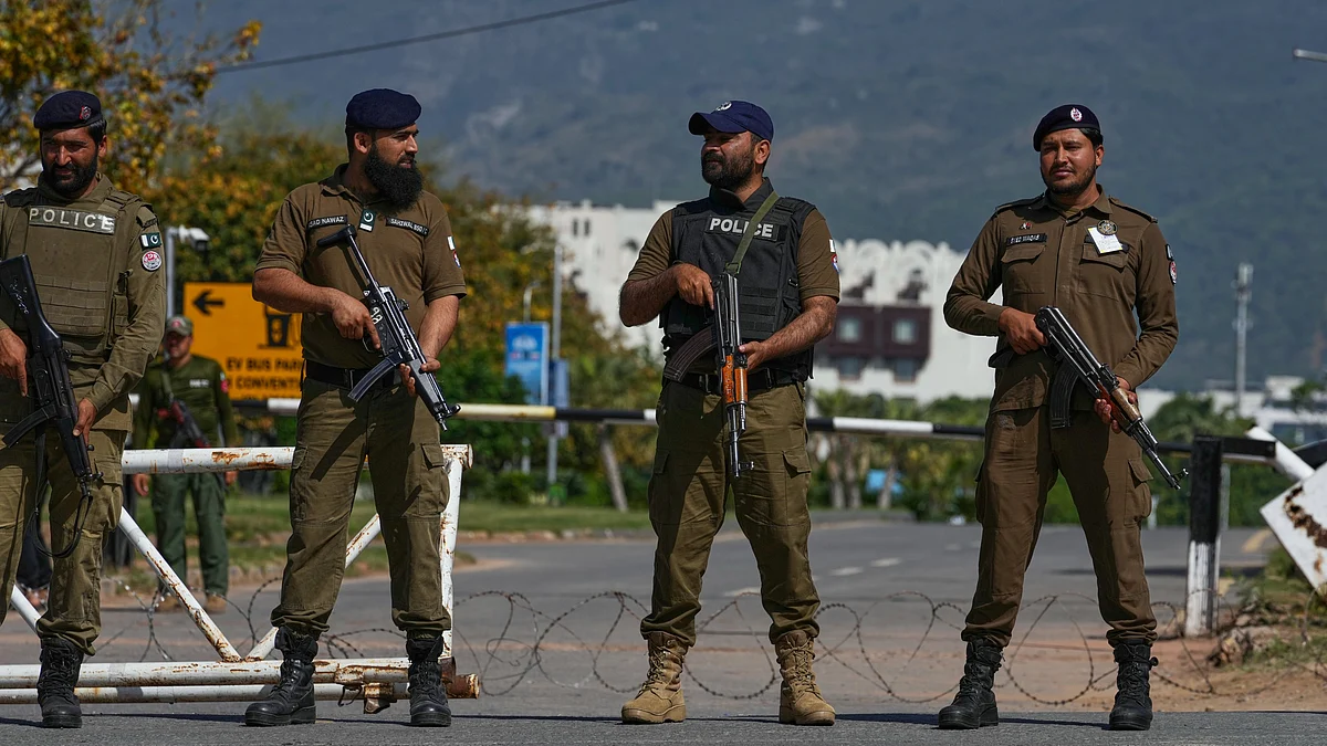 Police guard a checkpoint in Islamabad ahead of a possible second round of US–Iran talks.