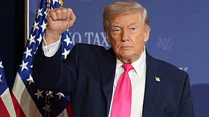 Donald Trump gestures after a roundtable event in Las Vegas.