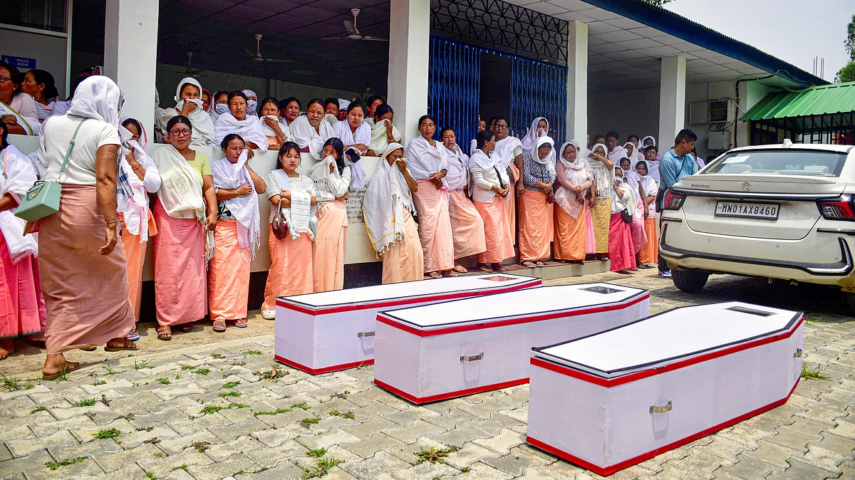 Kin of those killed in the recent firing incident receive the mortal remains in Imphal, 24 April