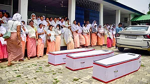 Kin of those killed in the recent firing incident receive the mortal remains in Imphal, 24 April