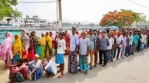 Voters line up at a polling booth
